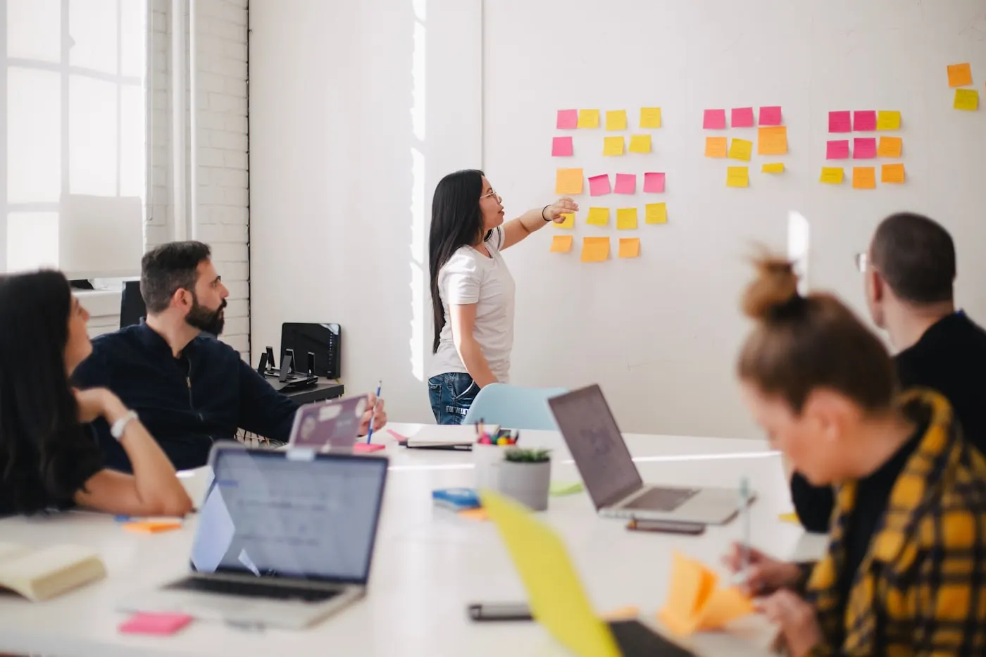 A data and design team working through a problem together